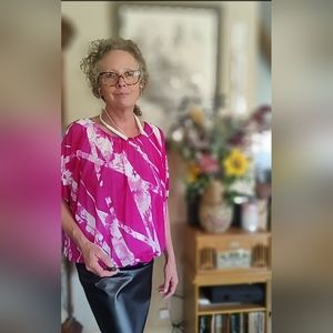 This Alfani pink and white blouse is a Medium. with full sleeves and a liner